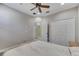 Bedroom features hardwood floors, ceiling fan and large closets at 4019 Alcott Cir, Orlando, FL 32828