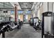 Fully equipped fitness center offering cardio and weightlifting machines and ample natural light at 4019 Alcott Cir, Orlando, FL 32828