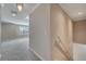 Hallway shows view of landing and sitting area with natural light at 4019 Alcott Cir, Orlando, FL 32828