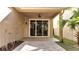 Covered patio with ceiling fan, sliding glass doors, and brick pavers at 4019 Alcott Cir, Orlando, FL 32828