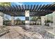 Outdoor pergola with picnic tables and benches providing a relaxing and shaded community gathering space at 4019 Alcott Cir, Orlando, FL 32828