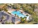 Aerial view of a large community pool featuring a waterfall and jacuzzi at 4019 Alcott Cir, Orlando, FL 32828