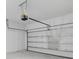 Spacious garage with automatic door offers secure parking and extra storage at 5960 Vision Rd, St Cloud, FL 34771