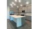 Spacious kitchen island with stainless steel appliances, and recessed lighting at 5960 Vision Rd, St Cloud, FL 34771