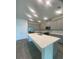 Open-concept kitchen with a large island, stainless steel appliances, and recessed lighting at 5960 Vision Rd, St Cloud, FL 34771