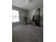 Versatile bedroom presents a zebra art print, exercise equipment and generous space at 680 Caribou Ct, Apopka, FL 32703