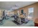 Well-equipped gym with modern exercise equipment, including a treadmill and weight machines at 7624 Bay Port Rd # 40, Orlando, FL 32819