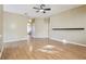 Spacious living room with wood flooring and lots of natural light at 7624 Bay Port Rd # 40, Orlando, FL 32819