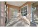 Enclosed tiled patio with multiple access points and natural light at 7624 Bay Port Rd # 40, Orlando, FL 32819