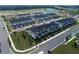 Aerial view of a newly constructed neighborhood with townhomes and community amenities at 768 Pointe Emerson Blvd, Apopka, FL 32703