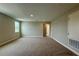 Carpeted bonus room with window and access to a bathroom at 780 Pointe Emerson Blvd, Apopka, FL 32703