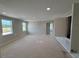 Bright living room featuring recessed lighting, neutral walls, and large windows for plenty of natural light at 780 Pointe Emerson Blvd, Apopka, FL 32703