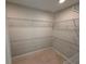 A walk-in closet with wire shelving to help organize your wardrobe at 780 Pointe Emerson Blvd, Apopka, FL 32703