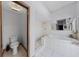 Bright bathroom featuring a toilet, walk-in shower and a jetted tub for relaxation at 9532 Bay Vista Estates Blvd # 1, Orlando, FL 32836