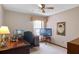 Office space featuring a desk, monitor, chair, and a window offering natural light at 9532 Bay Vista Estates Blvd # 1, Orlando, FL 32836