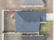 Aerial view of the house showing the layout of the backyard at 1230 Woodlark Dr, Haines City, FL 33844