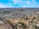 Panoramic aerial shot of a large residential development, highlighting its layout and suburban integration with surrounding areas at 1230 Woodlark Dr, Haines City, FL 33844