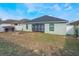 Exterior of a home, including backyard and patio at 1230 Woodlark Dr, Haines City, FL 33844