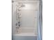 Clean bathroom featuring a shower with a curtain at 1230 Woodlark Dr, Haines City, FL 33844