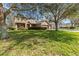 Beautiful two-story house with a paved driveway and a well-maintained lawn at 1037 Truffles Ct, Apopka, FL 32712