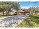 Lovely two-story home boasting a three-car garage, paved driveway, and green lawn at 1037 Truffles Ct, Apopka, FL 32712