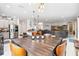 Open floor plan showcasing the kitchen, dining area, and living room, perfect for entertaining at 1037 Truffles Ct, Apopka, FL 32712