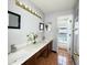 Bathroom with dual sinks, and white marble counters at 12017 Fambridge, Orlando, FL 32837