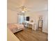 Bedroom with a large window and a desk with lighted mirror at 12017 Fambridge, Orlando, FL 32837