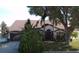 Charming single-story home featuring a well-maintained lawn, mature landscaping, and a two-car garage at 12017 Fambridge, Orlando, FL 32837