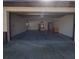 Spacious two-car garage with ample storage, and the door open to reveal it's ready for use at 12017 Fambridge, Orlando, FL 32837