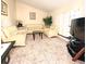 Inviting living room featuring an open floor plan, a television, and cozy furniture at 12017 Fambridge, Orlando, FL 32837