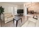 Cozy living room featuring an open floor plan, with lots of light, and modern furniture arrangement at 12017 Fambridge, Orlando, FL 32837