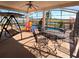 Outdoor seating area with a swing and a table at 12017 Fambridge, Orlando, FL 32837