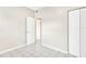 Bedroom featuring light walls, tile flooring and closet at 1202 Ferndell Rd, Orlando, FL 32808