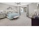 Serene bedroom featuring a plush bed, mirrored nightstands, and calming décor at 13154 Pergola Ave, Orlando, FL 32832