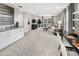 Spacious living room with plush carpeting, comfortable sectional sofa, and stylish décor at 13154 Pergola Ave, Orlando, FL 32832
