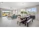 Bright living and dining areas featuring tile flooring, neutral decor, and lots of natural light at 13154 Pergola Ave, Orlando, FL 32832