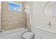 Bathroom with tub and shower combo, stylish fixtures and finishes at 15240 Sw 43Rd Ct, Ocala, FL 34473
