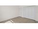 This bedroom features vinyl floors, neutral walls and a spacious closet at 15240 Sw 43Rd Ct, Ocala, FL 34473