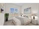 Cozy bedroom with a soft color palette, comfortable furnishings, and plenty of natural light at 15240 Sw 43Rd Ct, Ocala, FL 34473
