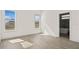 Bright bedroom with wood-look floors and view of the bathroom at 15240 Sw 43Rd Ct, Ocala, FL 34473