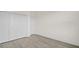 This bedroom has vinyl floors, neutral walls and a spacious closet at 15240 Sw 43Rd Ct, Ocala, FL 34473