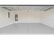 Spacious two car garage with epoxy floor, water heater and garage door at 15240 Sw 43Rd Ct, Ocala, FL 34473