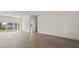 Spacious living area with wood-look flooring, and lots of natural light at 15240 Sw 43Rd Ct, Ocala, FL 34473