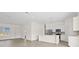 Open living area with wood-look flooring, and lots of natural light at 15240 Sw 43Rd Ct, Ocala, FL 34473