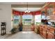 Cozy breakfast nook with a bay window, water view, and ample natural light, perfect for morning coffee and relaxation at 1646 Arash Cir, Port Orange, FL 32128