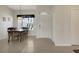 Formal dining area with tile flooring, pendant lighting, and a large window for natural light at 1646 Arash Cir, Port Orange, FL 32128