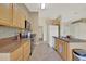 The spacious kitchen features stainless steel appliances and ample counter space, perfect for cooking and entertaining at 1646 Arash Cir, Port Orange, FL 32128
