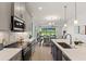 Beautiful modern kitchen with stainless steel appliances, light gray cabinetry and an open-concept design at 1807 Simonton Ave, Orlando, FL 32806