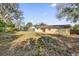Expansive backyard with mature trees and ample space for outdoor activities at 1866 Matterhorn Dr, Orlando, FL 32818